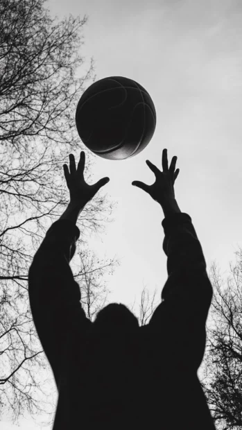 High contrast basketball shot with stylish film grain effect.