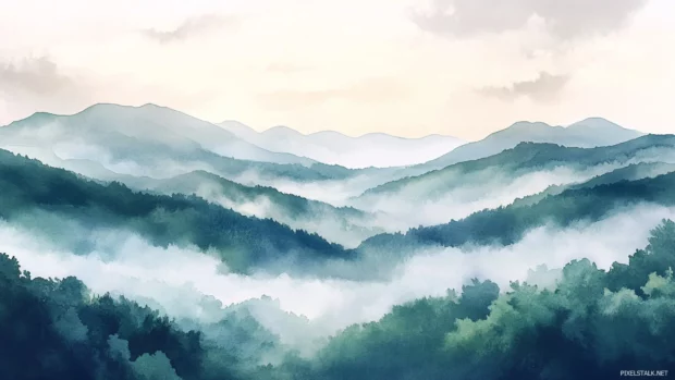 Hills wrapped in early morning watercolor clouds and mist.