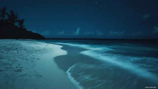Long exposure shot of gentle ocean waves at night.