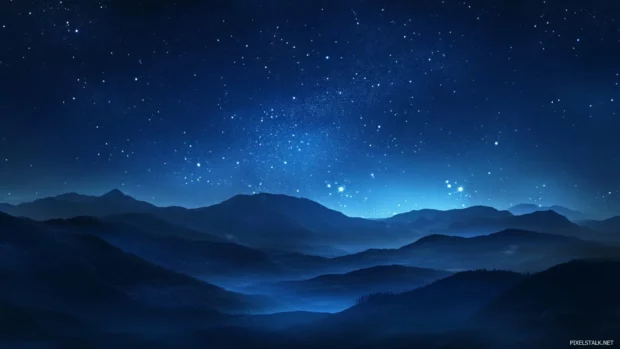 Mist rolling over hills kissed by stars.