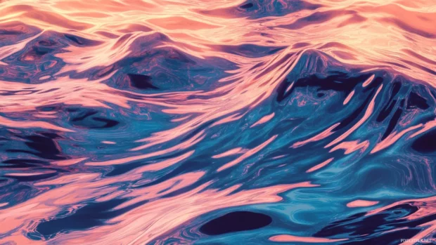 Ocean waves reflecting dreamy summer vibes wallpapers pattern in shimmering sunlight.