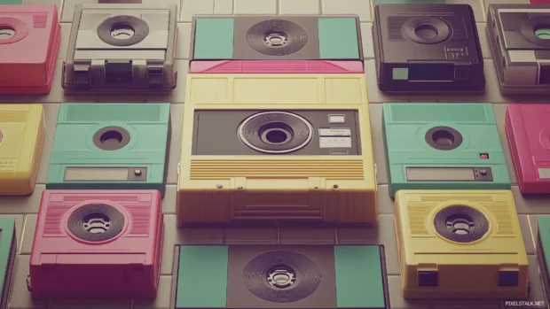 Old fashioned tile pattern showcasing boomboxes cassette tapes and musical notes pop of bright colors muted background nostalgic music vibe.