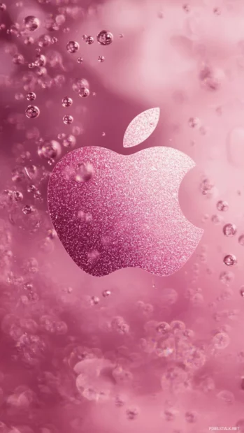 Pink Apple emblem on iPhone lock screen with delicate sparkle patterns.