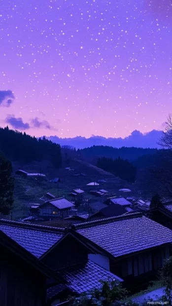 Pink stars resting on a sleepy village.