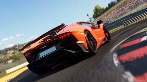 Rear shot of the Aventador in full throttle on a racetrack corner.