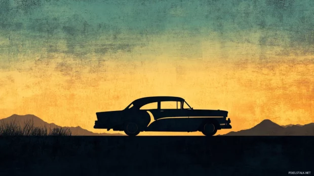 Retro car silhouette on road with grainy desert backdrop.