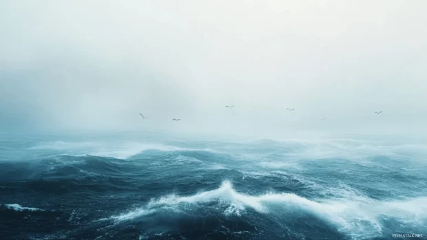 Soft mist hanging above watercolor ocean tides.