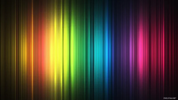 Spectrum rainbow watercolor background with a range of colors.