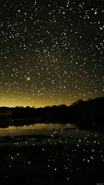 Starry reflections dancing across midnight lakes.