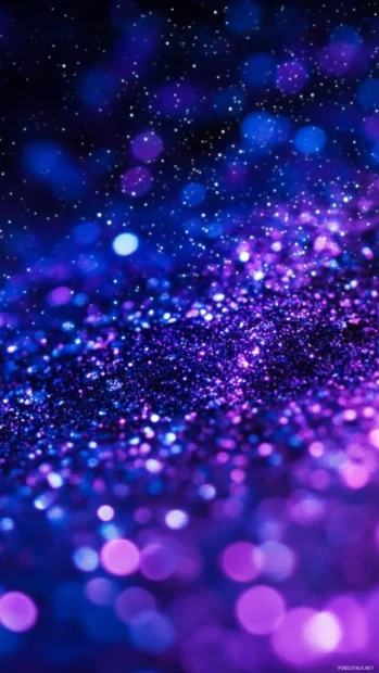 Stars and cosmic dust in neon purple and blue, Dark neon galaxy wallpaper.