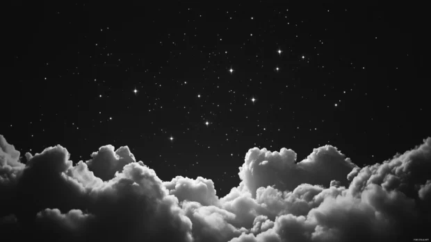 Stars peeking through tattered night clouds, capturing the essence of Deep black starry space background.