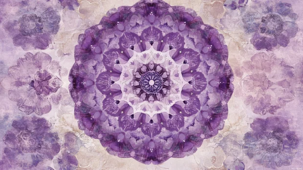 Stylized mandala with embedded floral shapes in purple.