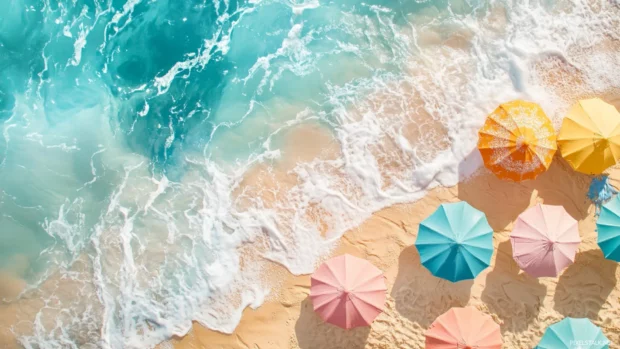 Summer Vibes bursts into life with a lively dance of pastel colored beach umbrellas, golden sand and soft waves.