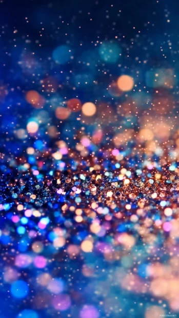 Tiny sparkling stars over a gradient blue to indigo sky, giving the impression of a peaceful evening as the stars start to appear.