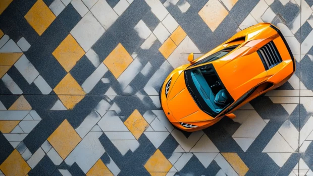 Top down Lamborghini Huracan wallpaper with orange Huracan parked on modern geometric tiles.