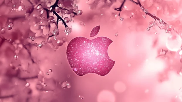 Trendy Pink Apple Wallpapers showcasing pink Apple logo surrounded by delicate patterns.
