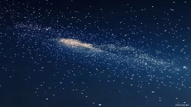 Twinkling stars and a prominent Milky Way stretch across the dark blue expanse in a mesmerizing starry sky, creating a sense of wonder and tranquility.