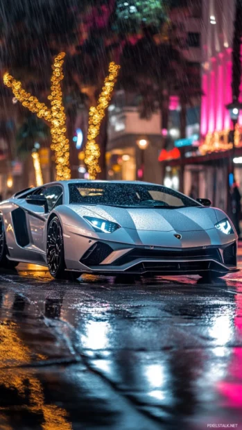 Vertical Lamborghini Aventador phone wallpaper with reflections of city lights on a wet pavement.