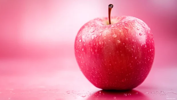 Vibrant pink Apple wallpaper blending smooth gradients and gentle highlights.