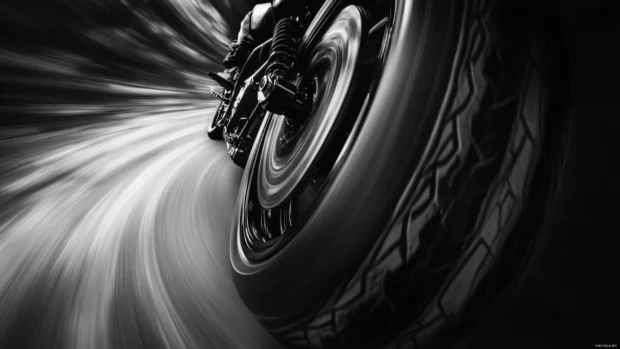 Zoomed shot of Harley Davidson tire spinning.