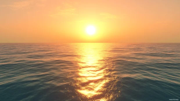 2K QHD wallpaper with Golden sunset over a calm ocean horizon reflecting soft pastel skies emphasizing natural beauty.