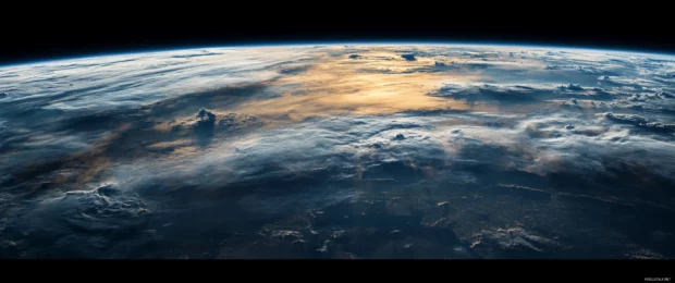 3440x1440 wallpaper showcasing the breathtaking view of Earth from space with detailed continents and clouds.