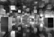 3d geometric wallpaper with floating cubes casting dramatic shadows across reflective surface.