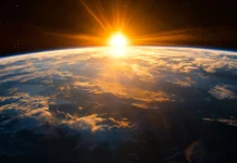 A breathtaking sunset casting light on Earths atmosphere, high resolution satellite imagery.