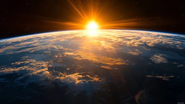 A breathtaking sunset casting light on Earths atmosphere, high resolution satellite imagery.