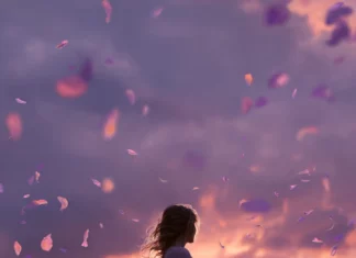 A dreamy portrait of a lavender garden at sunset, petals caught in the breeze.