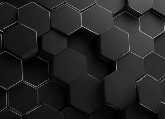 A minimalist black geometric wallpaper displaying thin line hexagon pattern on smooth matte canvas.