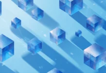 A modern blue geometric wallpaper showcasing floating 3d cubes casting soft shadows across bright blue background.