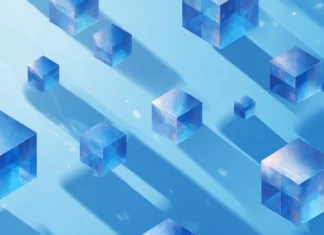 A modern blue geometric wallpaper showcasing floating 3d cubes casting soft shadows across bright blue background.