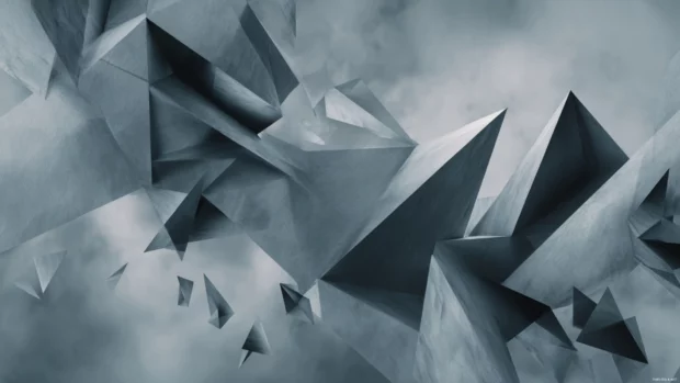 Abstract modern geometric wallpaper showcasing floating triangular shards over smoky gray background.