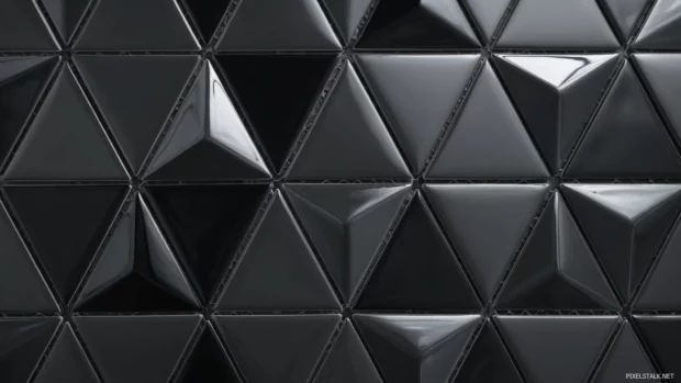 Black Geometric mosaic featuring triangular tiles in glossy and matte finishes.