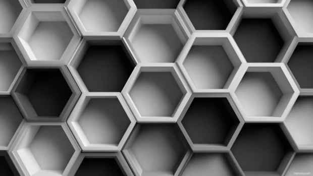 Black and white geometric desktop wallpaper featuring interlocking hexagon shapes with soft shadow depth.
