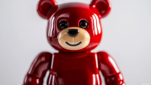 Close up of Bearbrick with glossy finish and simple white background.