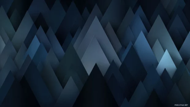 Dark blue geometric wallpaper blending sharp triangular peaks with moody midnight blue spectrum pattern.