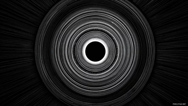 Dark themed Black Geometric radial design with glowing center and layered rings.