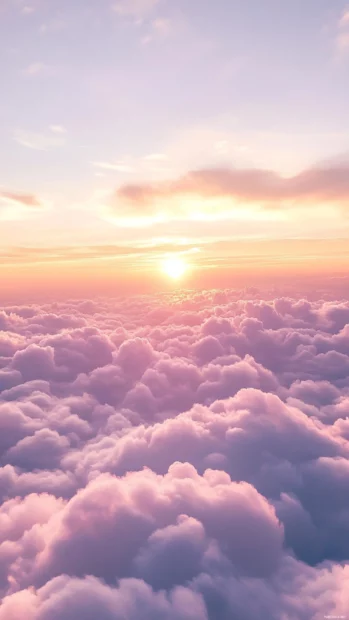 Dreamy aesthetic scene of Earth above soft cotton candy clouds.