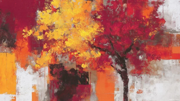 Fall colors in an abstract artistic composition blending bold shades of orange, yellow, and deep red.
