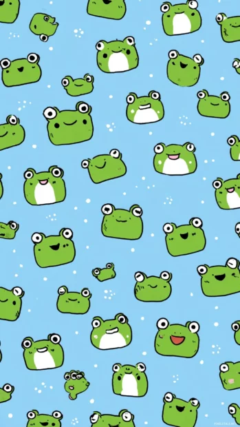 Kawaii Frog Wallpaper filled with mini frog faces in cute expressions scattered across a baby blue background.