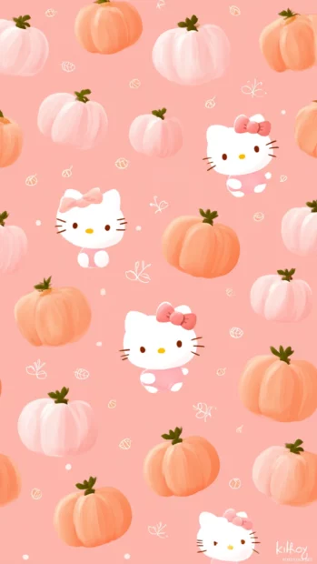 Kawaii fall Hello Kitty wallpaper iPhone design with pastel pumpkin pattern background and tiny leaf motifs.