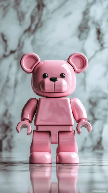 Pink Bearbrick posed in front of a clean studio wall.