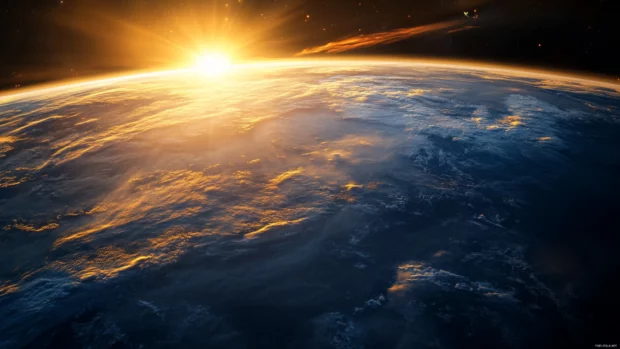 Realistic Earth wallpaper capturing the curvature of the globe and atmospheric haze from orbit.