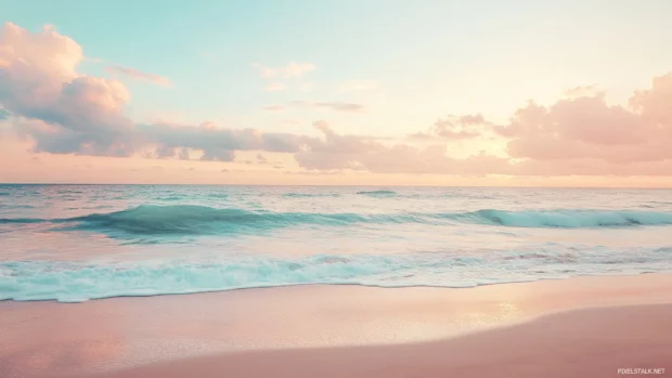 Serene beach scene with Earth tone filter and soft pastel sky.