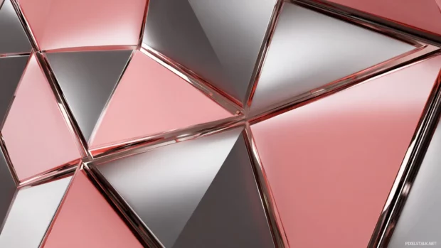 Sharp edged geometric design with pink triangles and reflective surfaces.