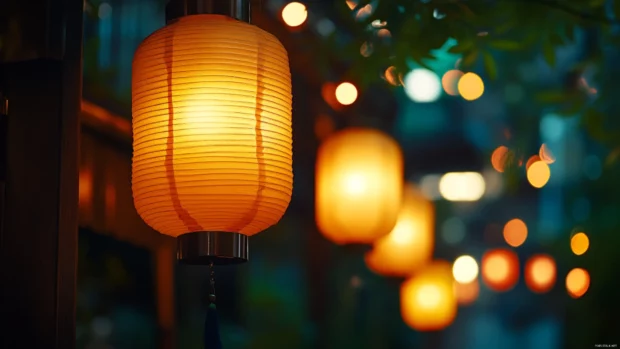 Traditional Japan streets in Kyoto lit by glowing lanterns at night, cinematic atmosphere.