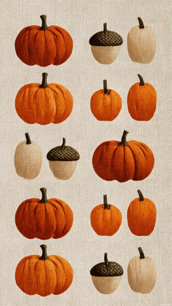 Aesthetic pumpkin background depicting stylized pumpkins and acorns in symmetrical rows on sandy linen texture.