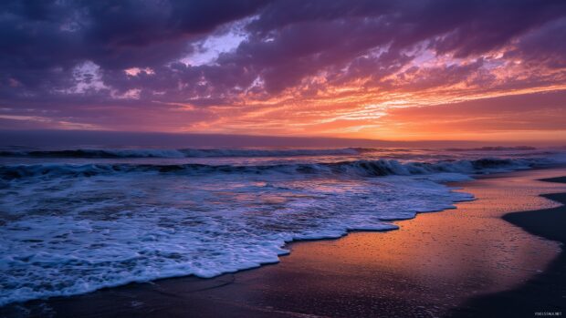 Beach image scenery, A dramatic sunset casting deep orange and violet hues over the tranquil ocean waves.